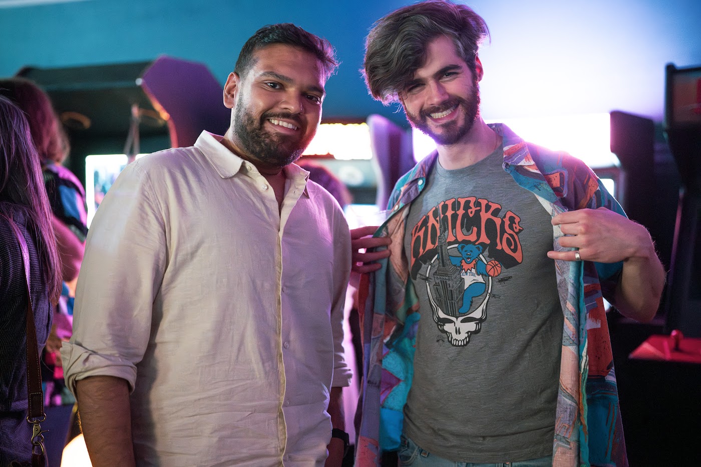 Two meetup guests posing together in the arcade