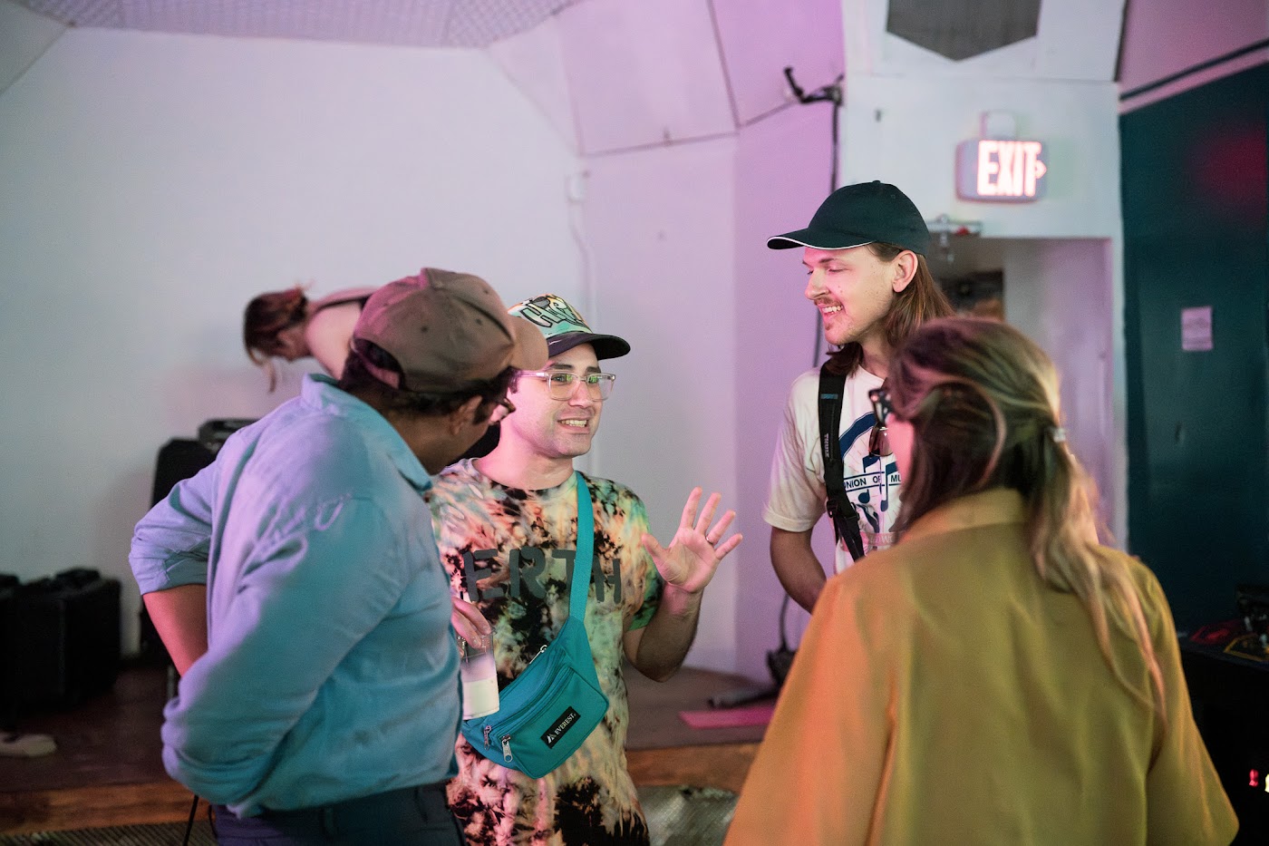 A small group sharing an animated conversation